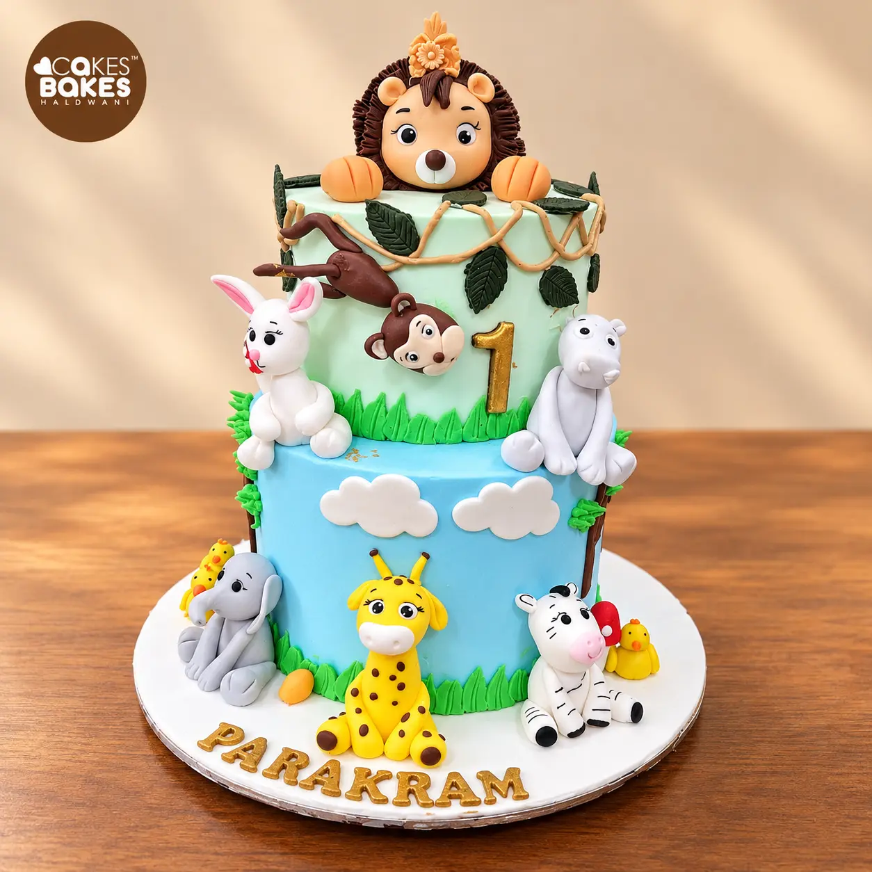 Jungle Friends First Birthday Cake — 100% eggless cake by Cakes & Bakes Haldwani
