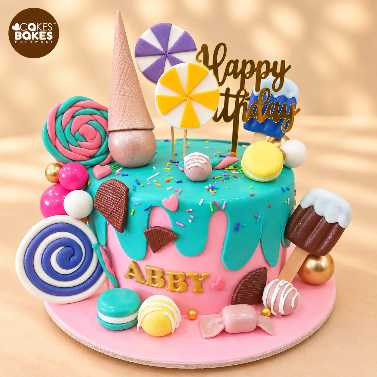 Colourful Candy-Themed Birthday Cake — 100% eggless cake by Cakes & Bakes Haldwani