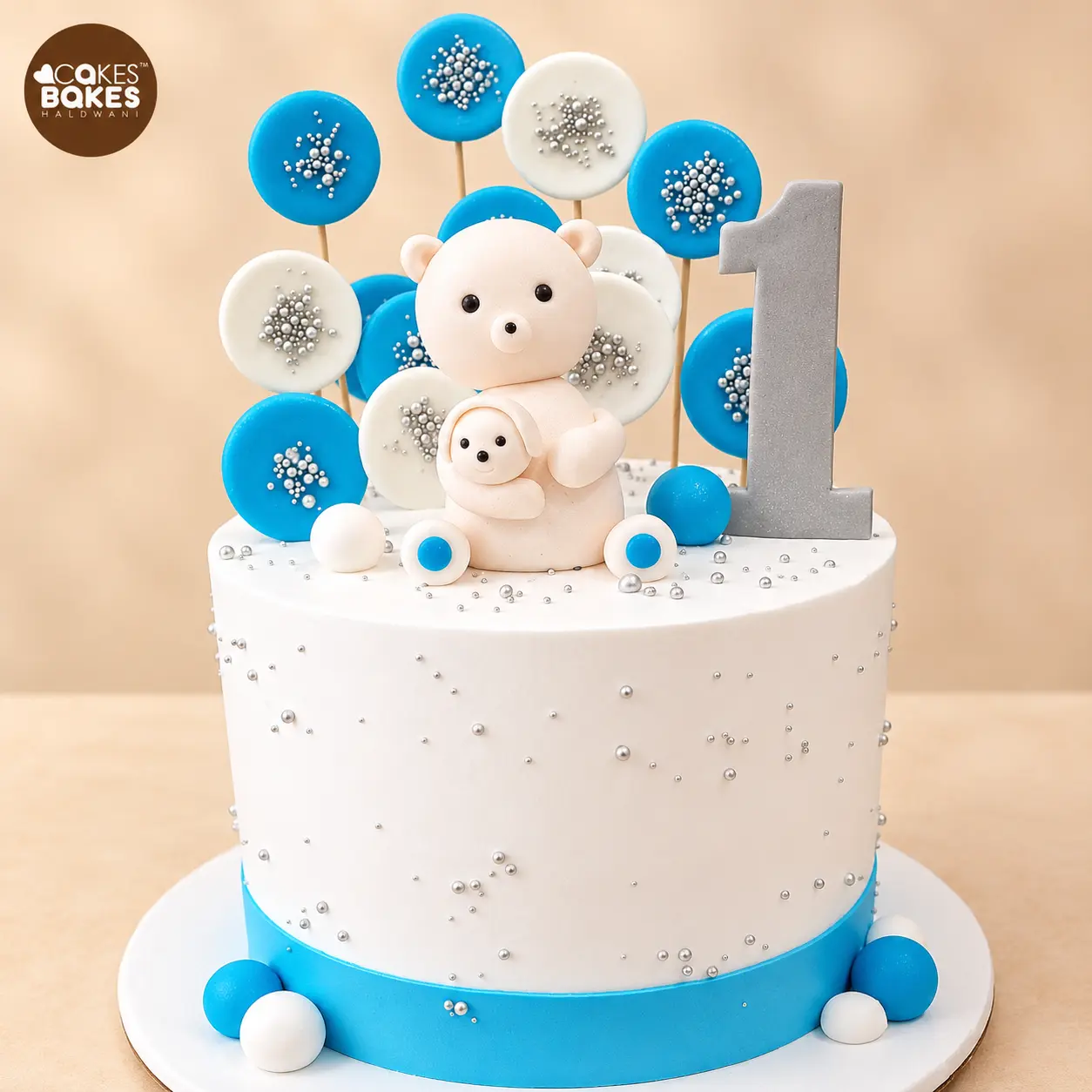 Blue Teddy Bear First Birthday Cake — 100% eggless cake by Cakes & Bakes Haldwani